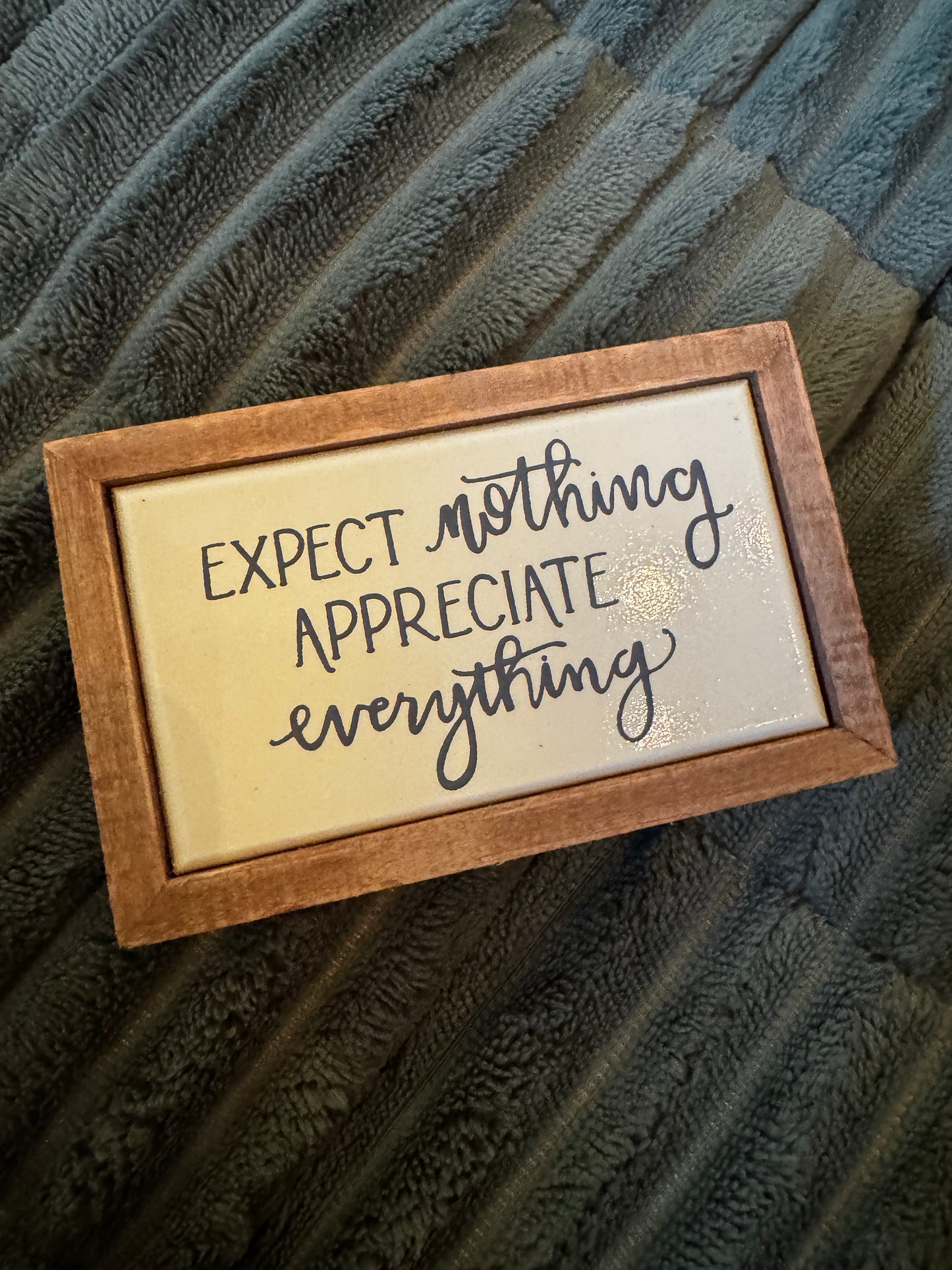 Expect Nothing Sign