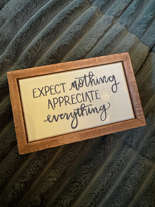 Expect Nothing Sign